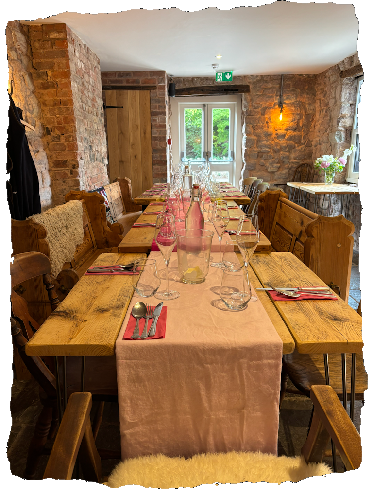 The Riverside Inn restaurant dining room set for guests